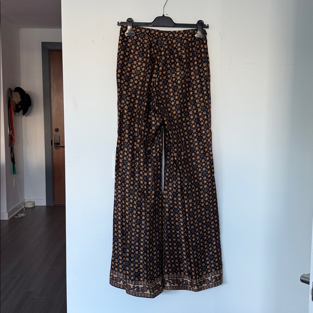 Sandro Star Patterned Trousers in Black and Orange